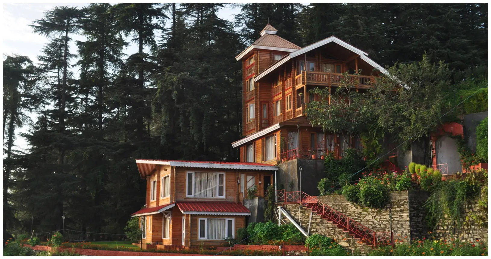 Enjoy a beautiful sunset from your room while staying at the Chalets Naldehra